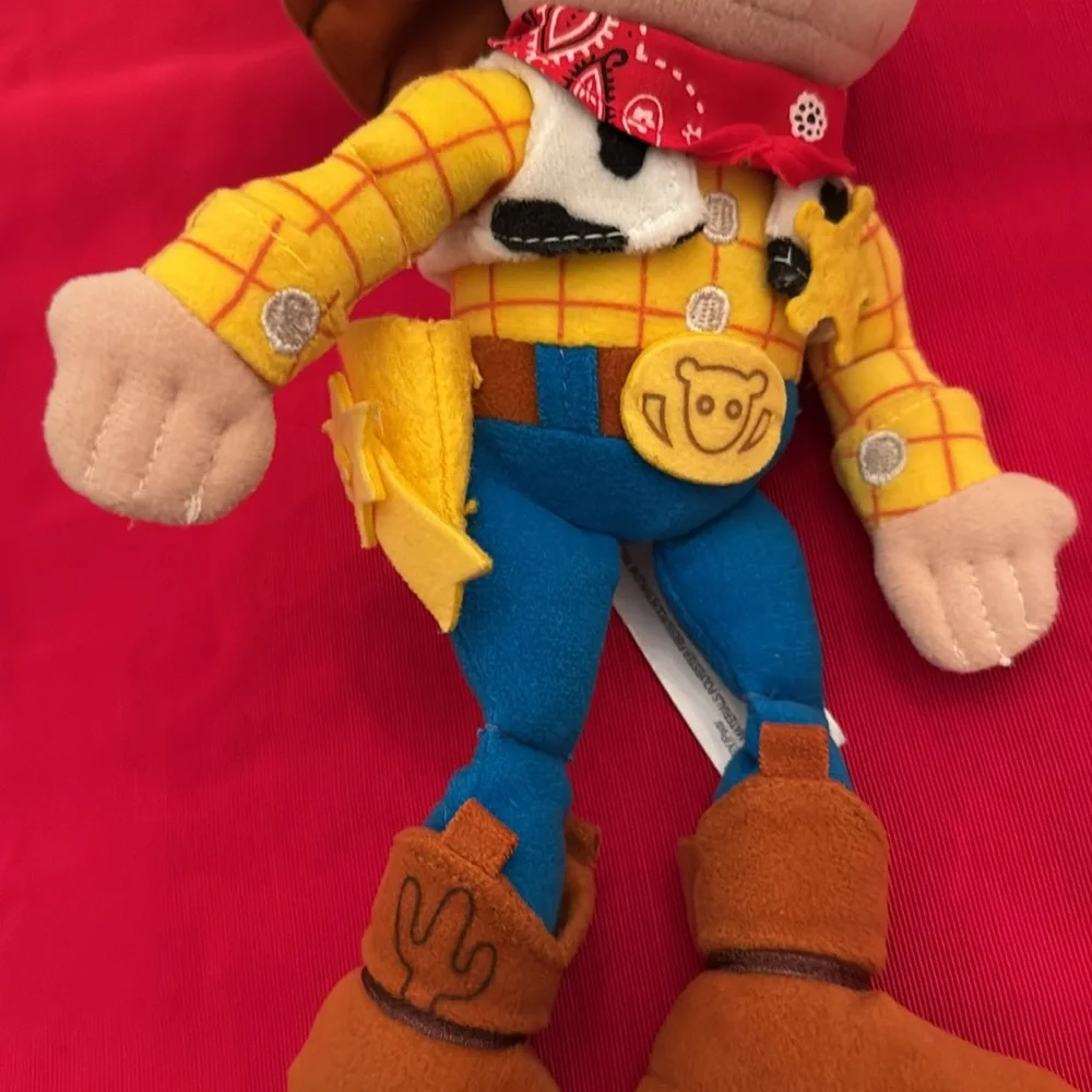 Woody Toy Story 11” red bandana, yellow sheriff’s star. Walt Disney World (OLCC)